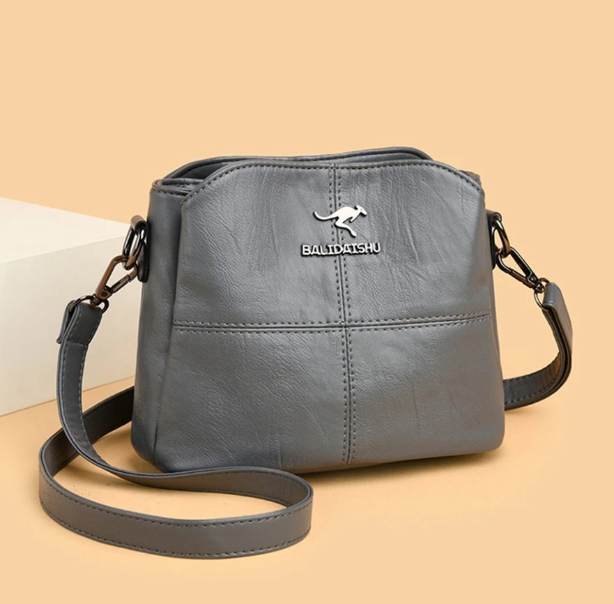 Women's Faux Leather Paneled Zip-Top Adjustable Crossbody Bag - Grey